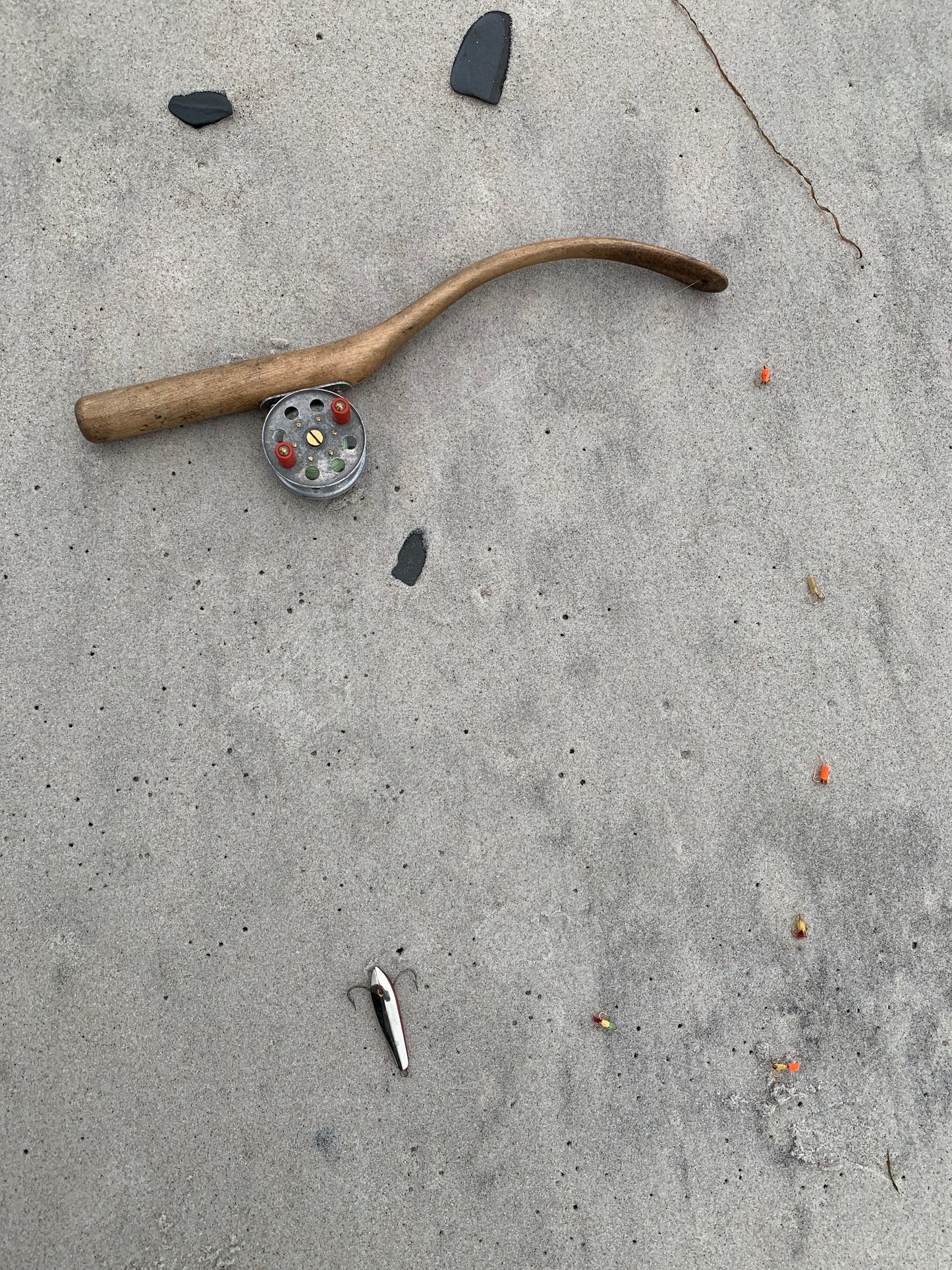 Gammalt franskt fiskespö med hjul