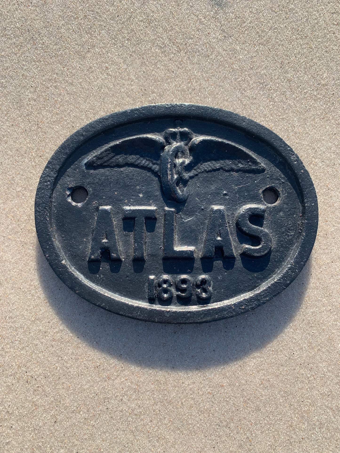 Atlas tecken
