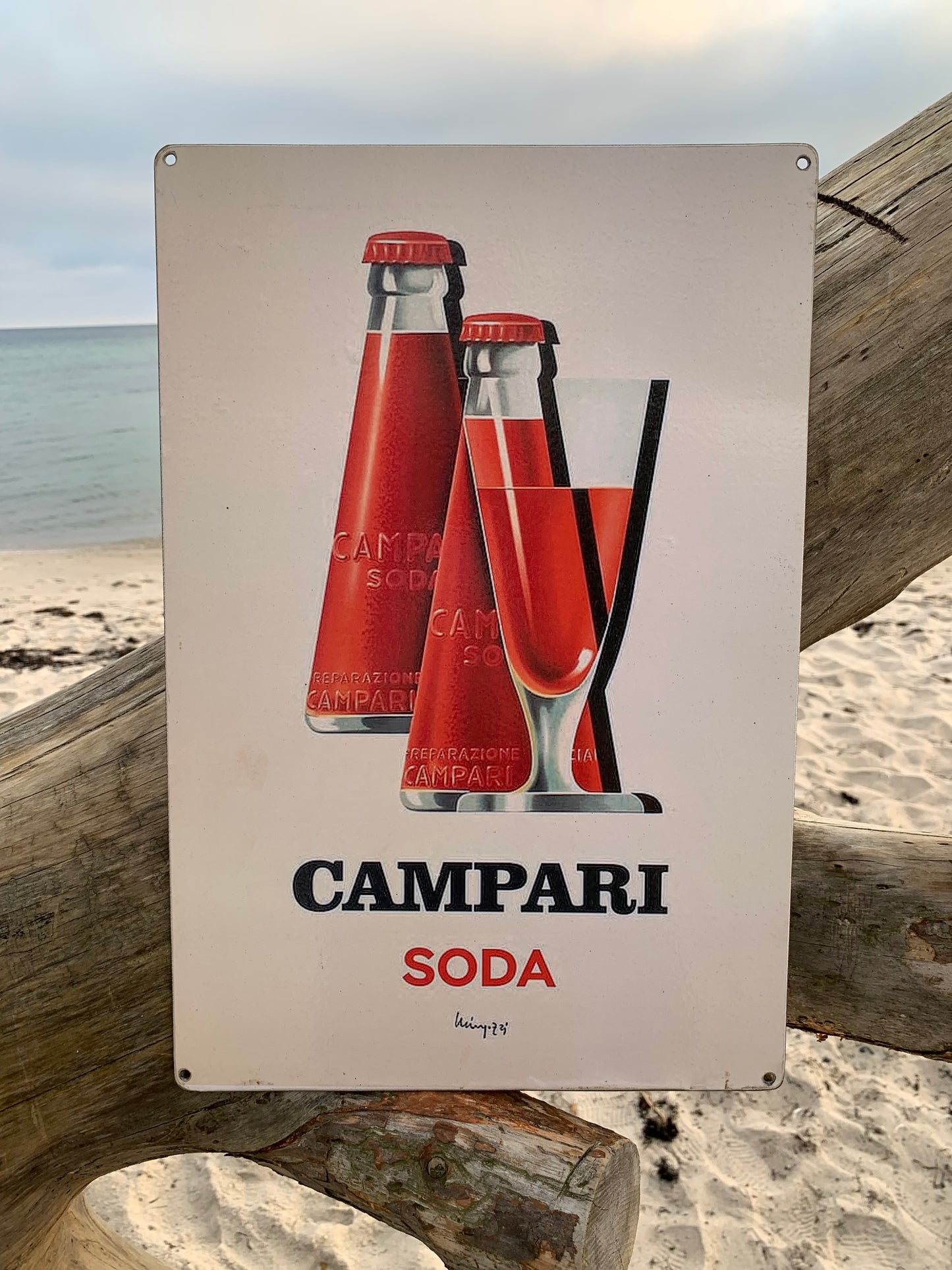 Campari reklam tecken