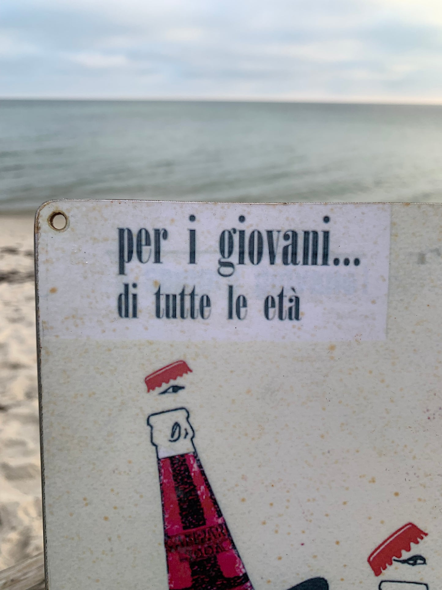 Campari reklam tecken