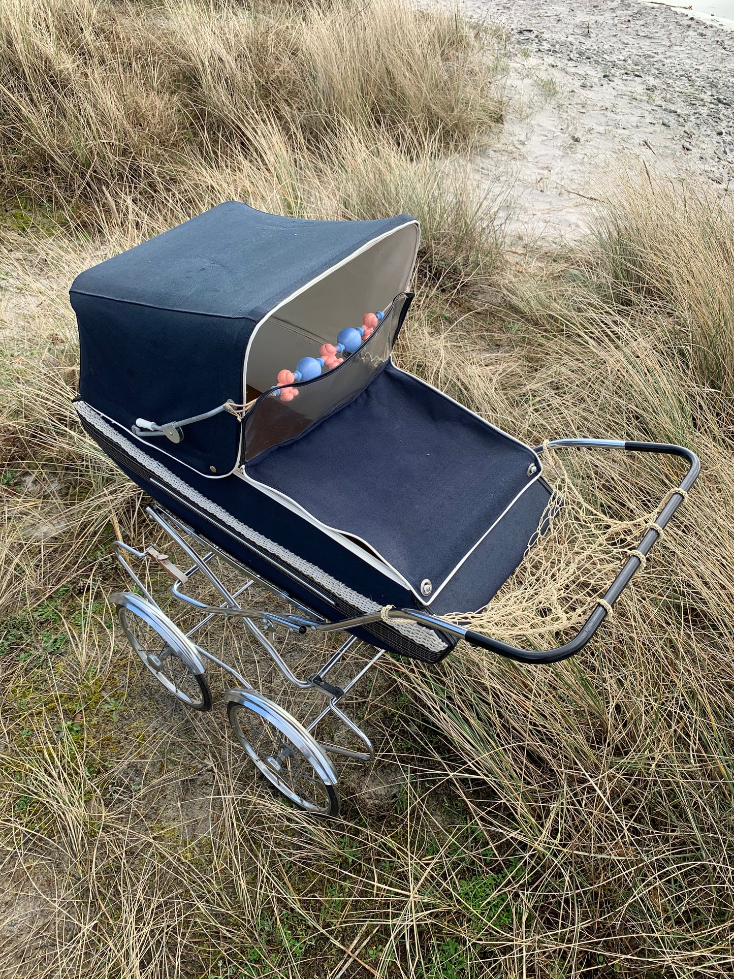 Dockvagn med shoppingnät