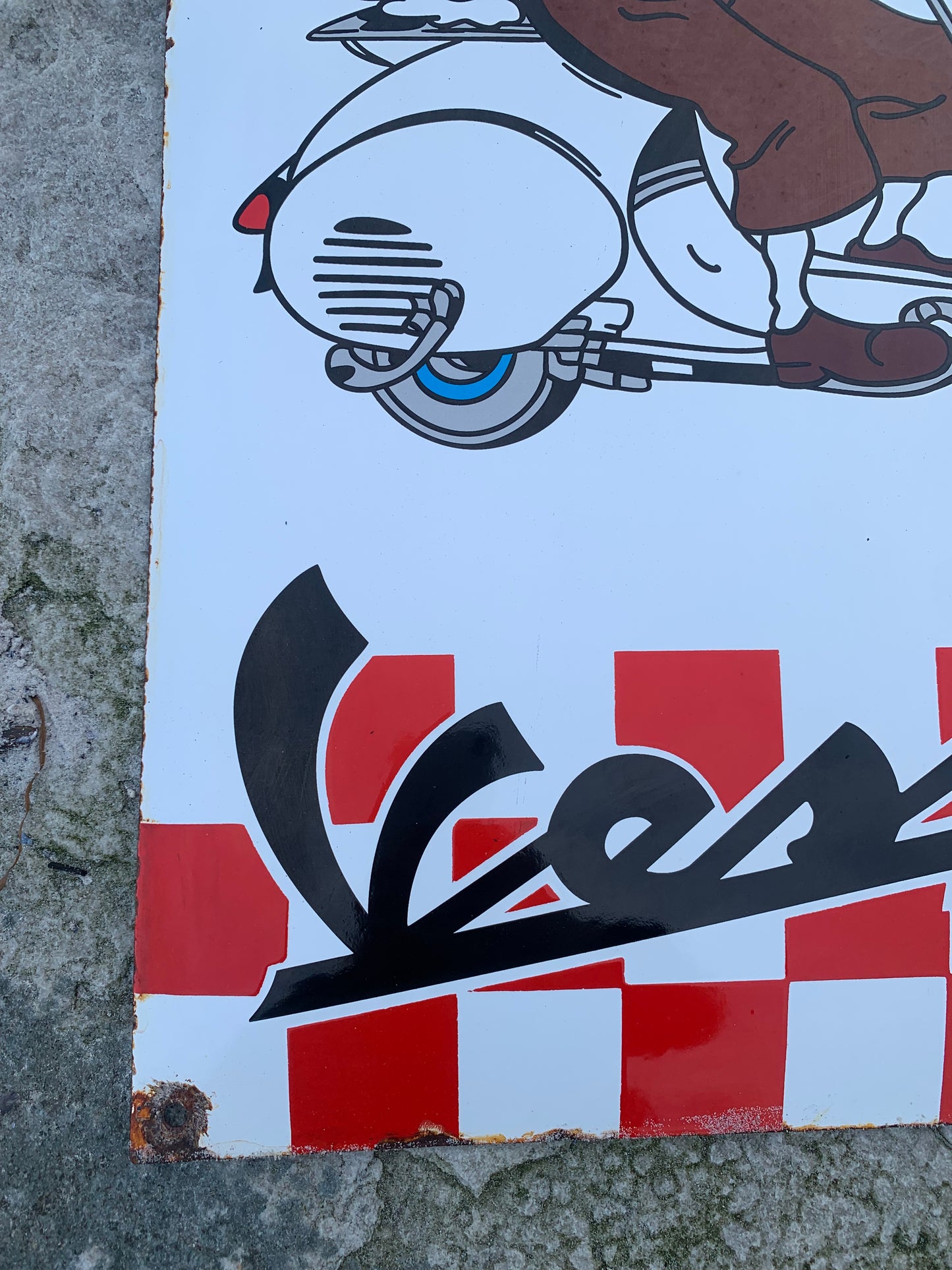 Tintin och Vespa-skylt