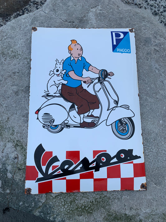 Tintin och Vespa-skylt